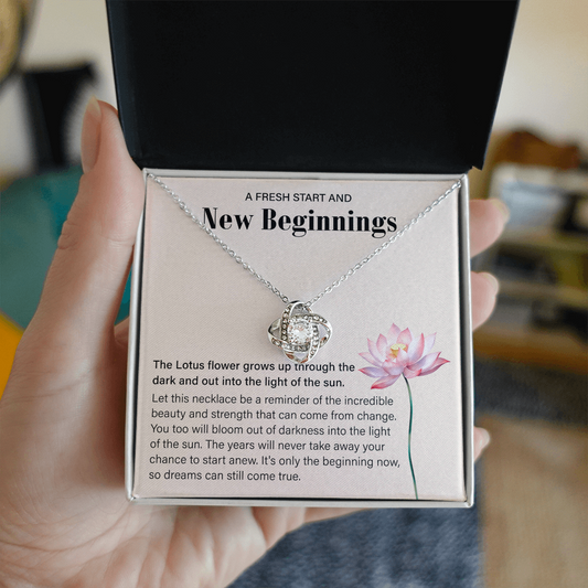 Silver Love Knot necklace in a box