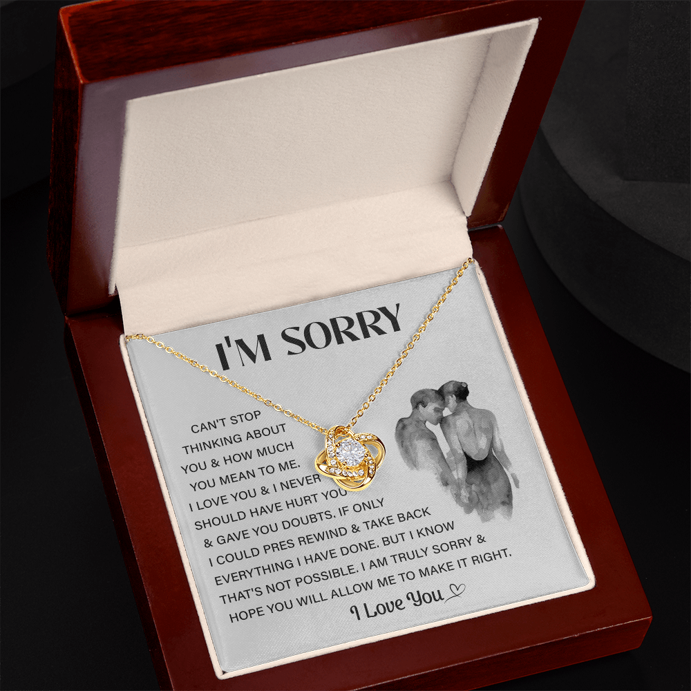 Silver Love Knot necklace in a white box