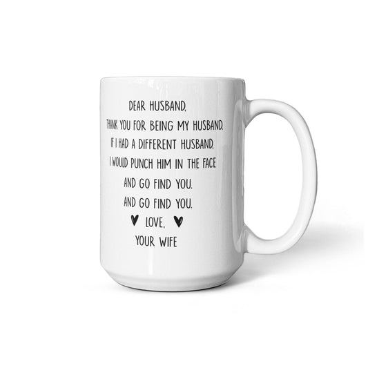 White ceramic mug with a humorous printed message for husbands