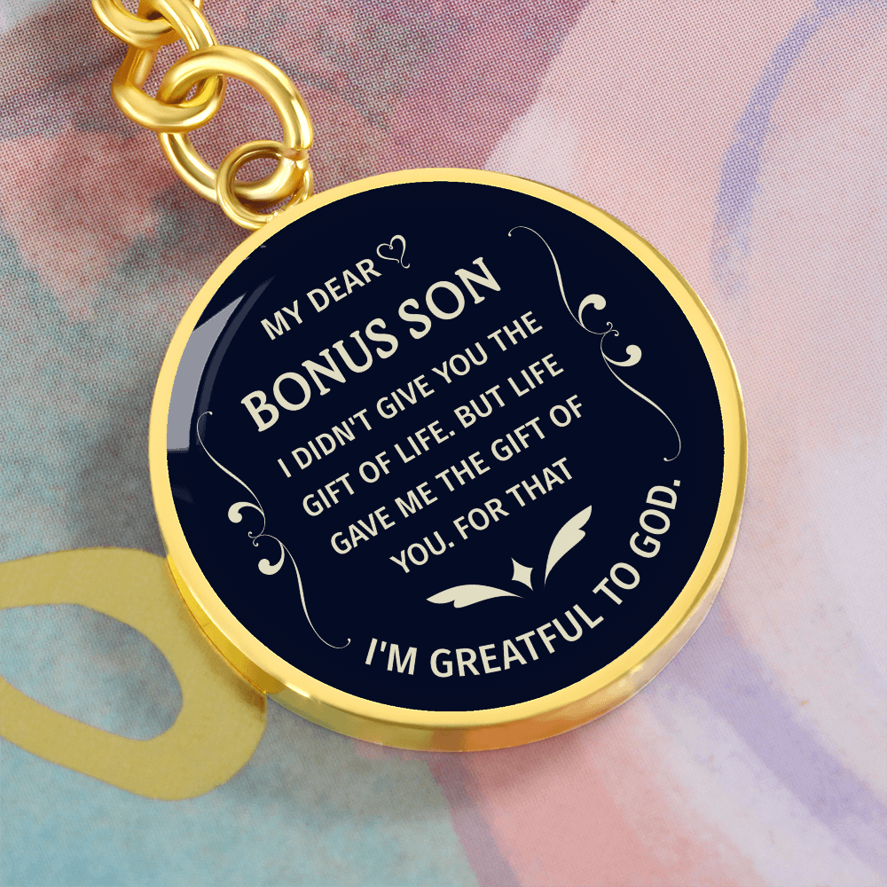 "Bonus Son" keychain in a deep blue and white design.