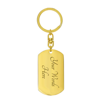 "Bonus Son" keychain in a deep blue and white design.

