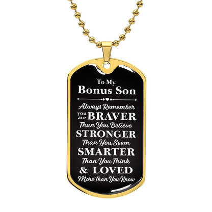 A dog tag with the words "My dear Bonus Son, love, Mom".

