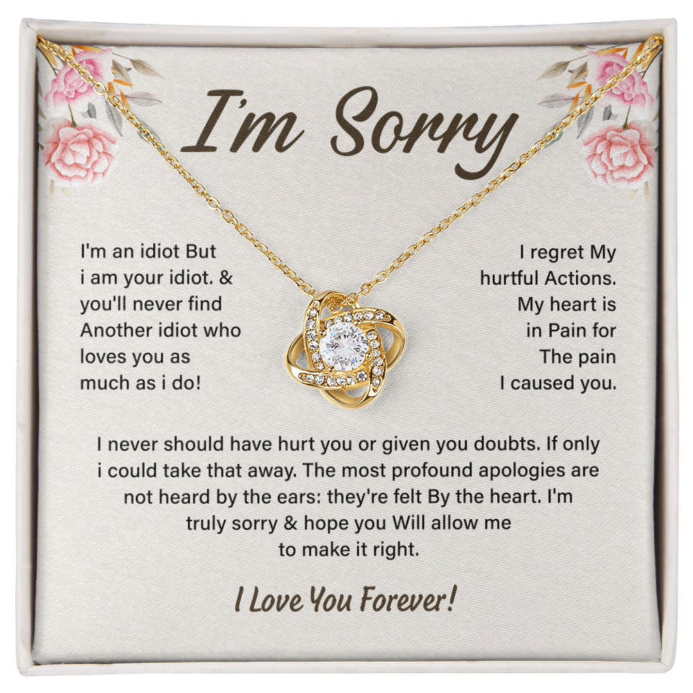 Silver Love Knot necklace in a white box