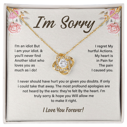 Silver Love Knot necklace in a white box