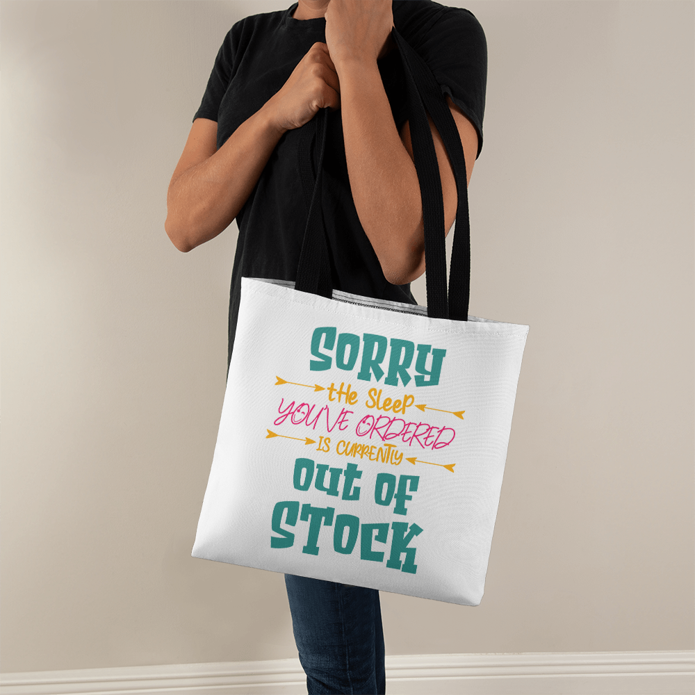 Funny canvas tote bag with red handles featuring the quote