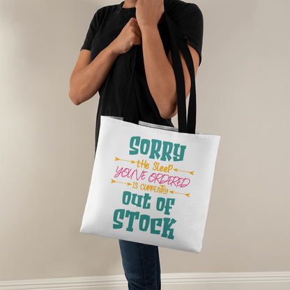 Funny canvas tote bag with red handles featuring the quote