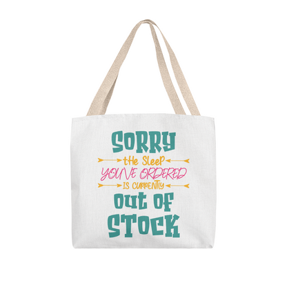 Funny canvas tote bag with red handles featuring the quote