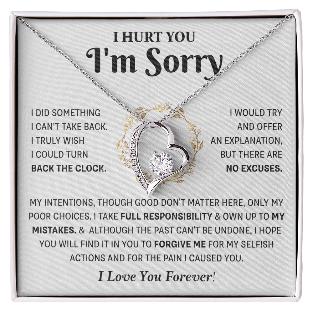 Silver Love Knot necklace in a white box