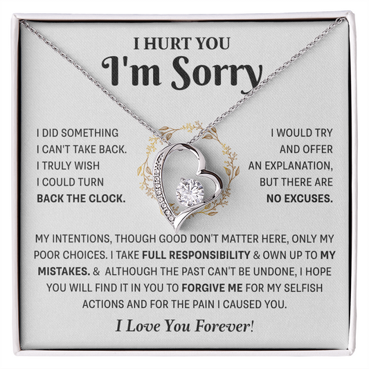 Silver Love Knot necklace in a white box