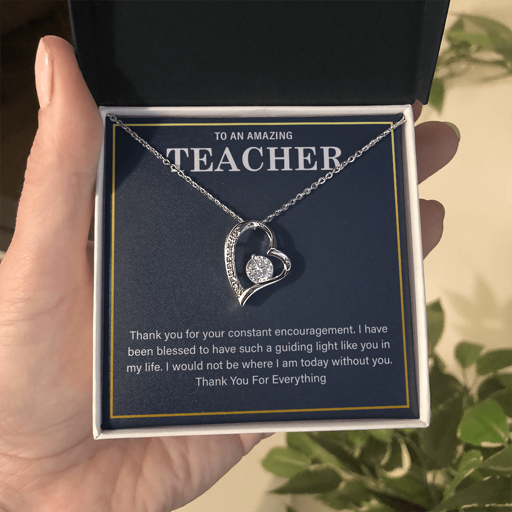 teacher gift necklace with heartfelt message in a display box.