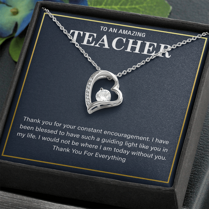 a teacher necklace with a heartfelt message card