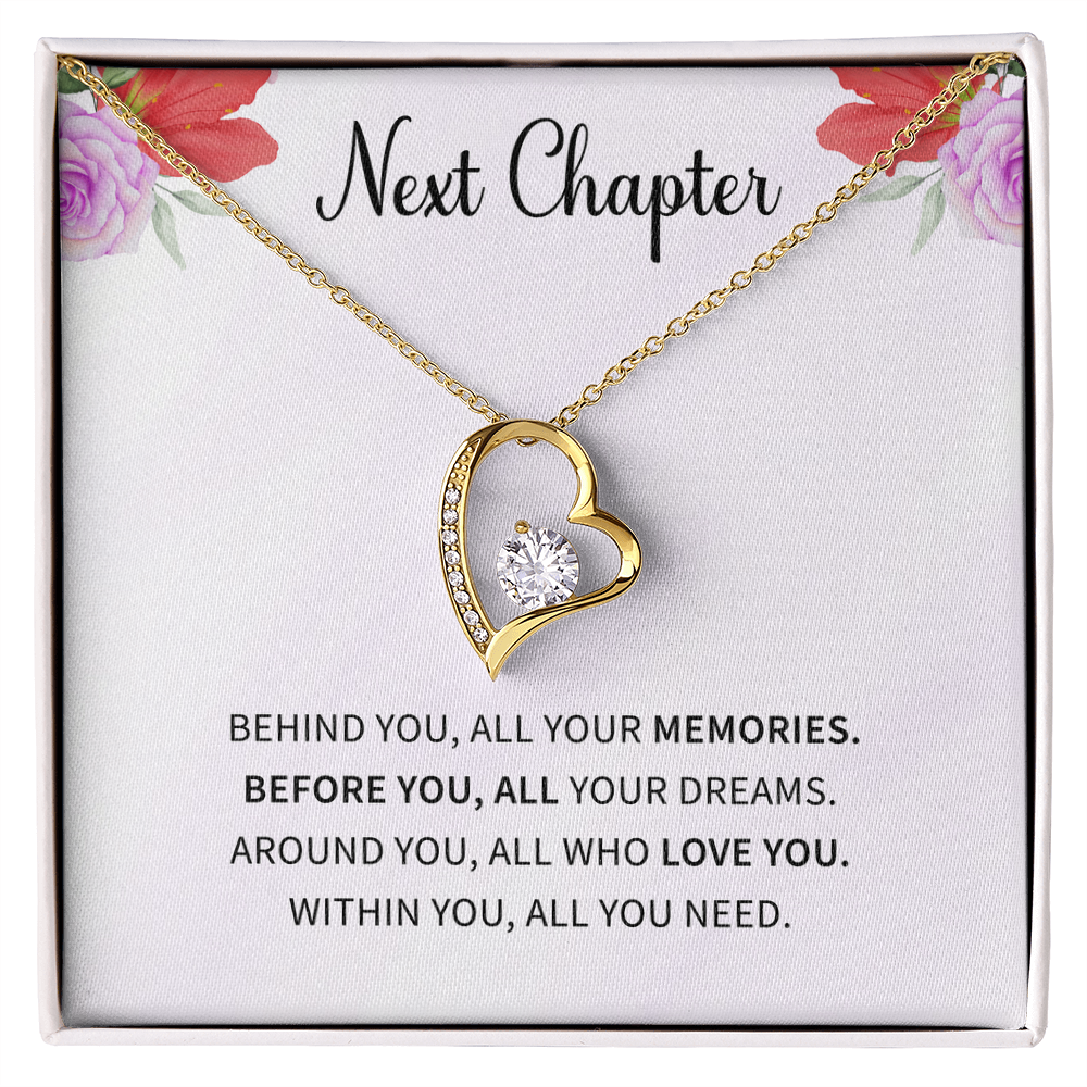 Silver open heart pendant necklace with a center stone, gifted with a "New Chapter" message.

