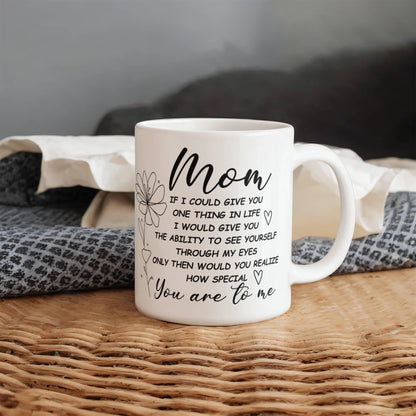 White ceramic mug with a heartfelt message for moms.