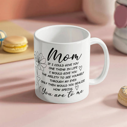 White ceramic mug with a heartfelt message for moms.