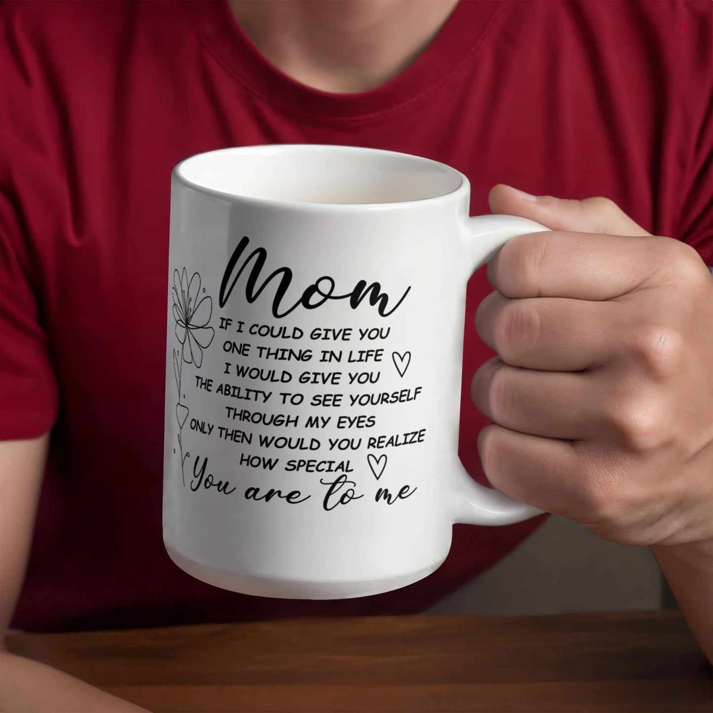 White ceramic mug with a heartfelt message for moms.